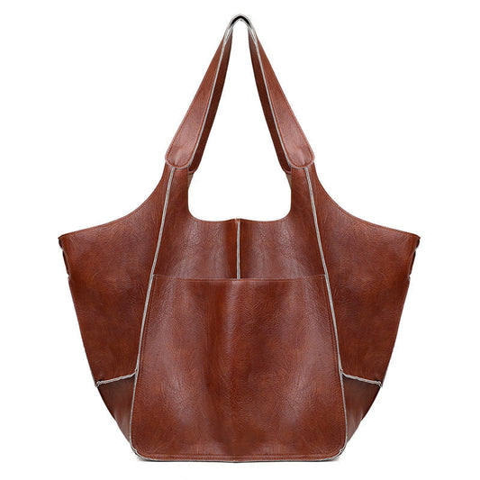 Niopia - Women’s Oversized PU Leather Weekender Bag with Handles and Shoulder Strap